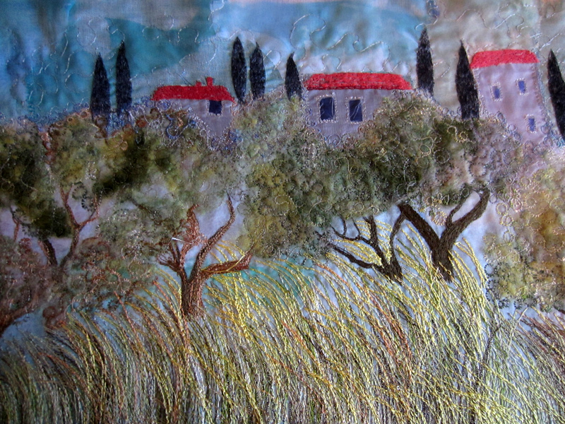 Olive grove. Detail of machine embroidered piece. Worked on silk organza with added felted wool details.